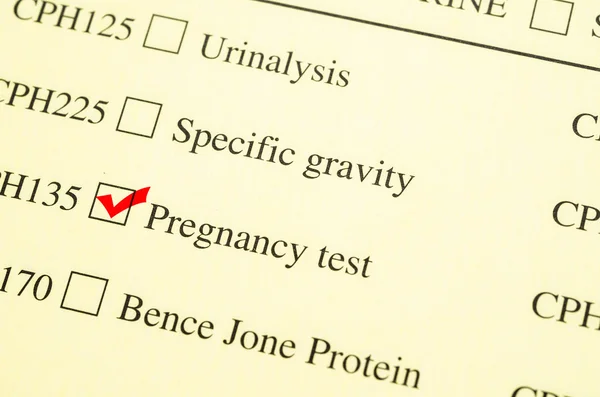 Check mark Medical form request Pregnancy test. — Stock Photo, Image