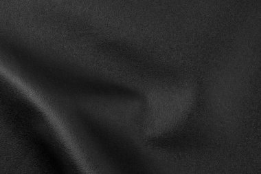 Doğal, hakiki siyah deri dokusu, yakın plan, makro, arka plan olarak soyut.