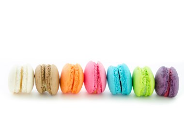 Colorful macarons on white background. clipart