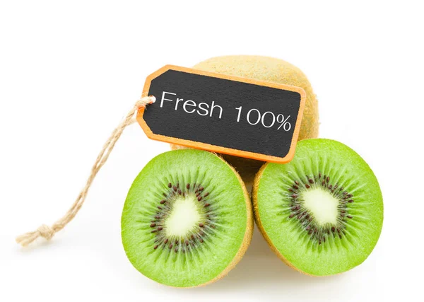 Felie de fructe proaspete kiwi și etichetă proaspătă 100% din lemn . — Fotografie, imagine de stoc