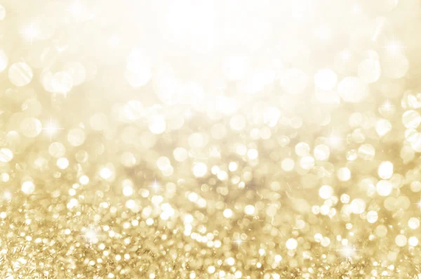 Lichter auf Gold mit Stern-Bokeh-Hintergrund. — Stockfoto