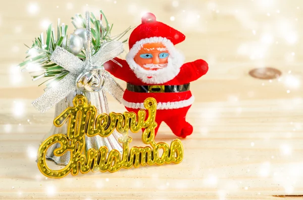 Xmas day: Merry christmas wording and santa doll — Stock Photo, Image