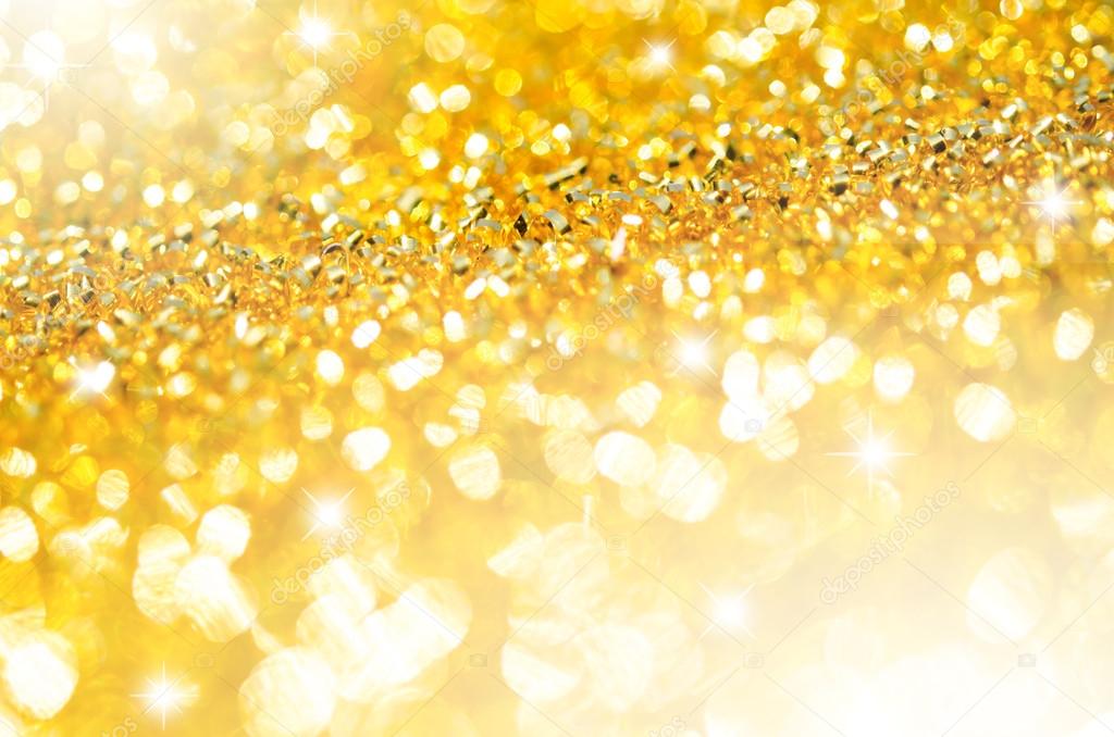 Gold light glitter background.