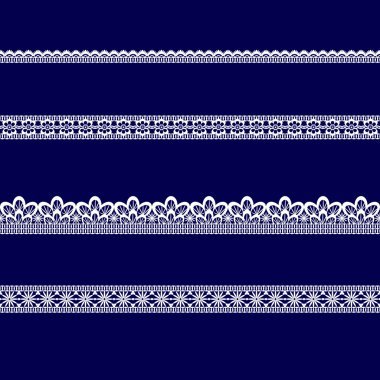 Beyaz dantel kurdeleler kümesi 