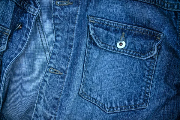 Photo Texture Une Veste Denim Avec Une Poche Bleue Des — Photo