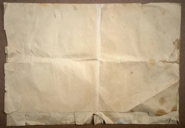 Starý Zažloutlý List Papíru Zmačkanými Okraji Skvrnami — Stock fotografie
