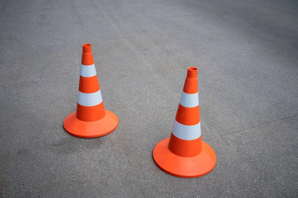 Two Orange Construction Cones Reflective Stripes Asphalt Road Repair Roadbed — Stock Photo, Image