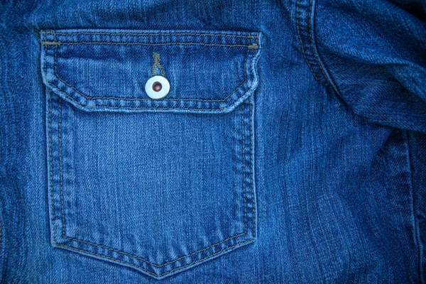 Foto Einer Blauen Denim Textur Mit Einer Tasche Und Einer — Stockfoto