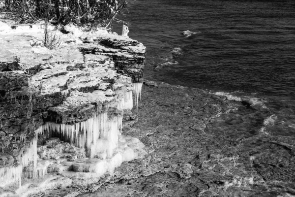 Cave point located in Door County Wisconsin with ice during winter