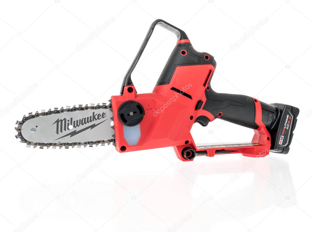 Winneconne, WI - 10 June 2021:  A package of Milwaukee hatchet chainsaw battery m12 on an isolated background