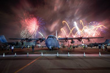 Oshkosh, WI - 27 July 2021: An AC-130J ghostrider gunship from AFSOC at EAA in Oshkosh with fireworks