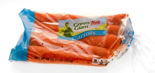 Green Giant carrots fresh in bag. — Stock Photo, Image