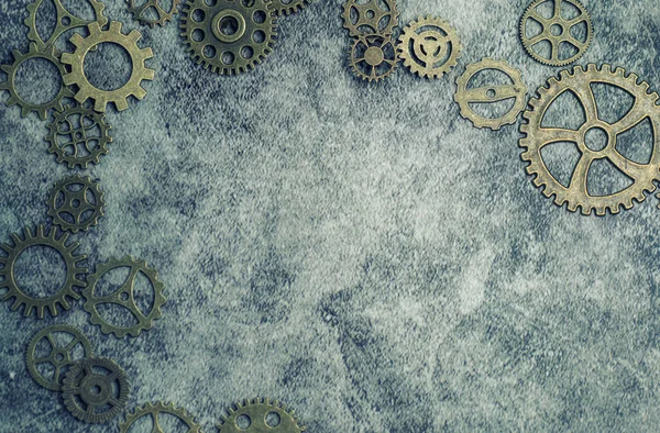 Steampunk background with different sized cogs and gears. Stock Photo