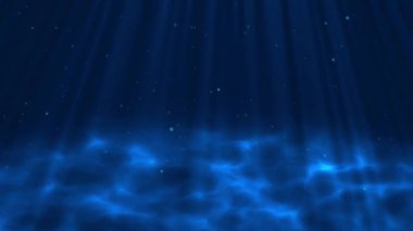 Güneş ışınları çok derin, berrak mavi su. Güneş ışığı su altında ışıldar. Küçük kabarcıklar