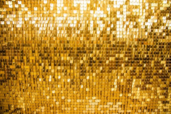 golden mosaic interior. Abstract golden background of sparkling Christmas lights.