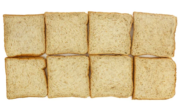 Bovenaanzicht van gesneden hele tarwe brood — Stockfoto