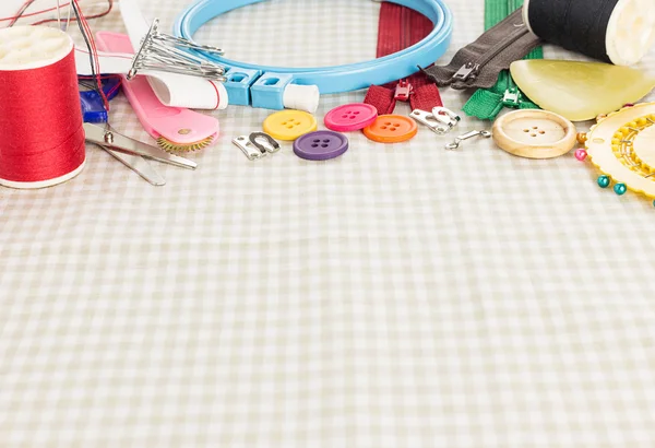 Embroidery tools on fabric as background — Stock Photo, Image