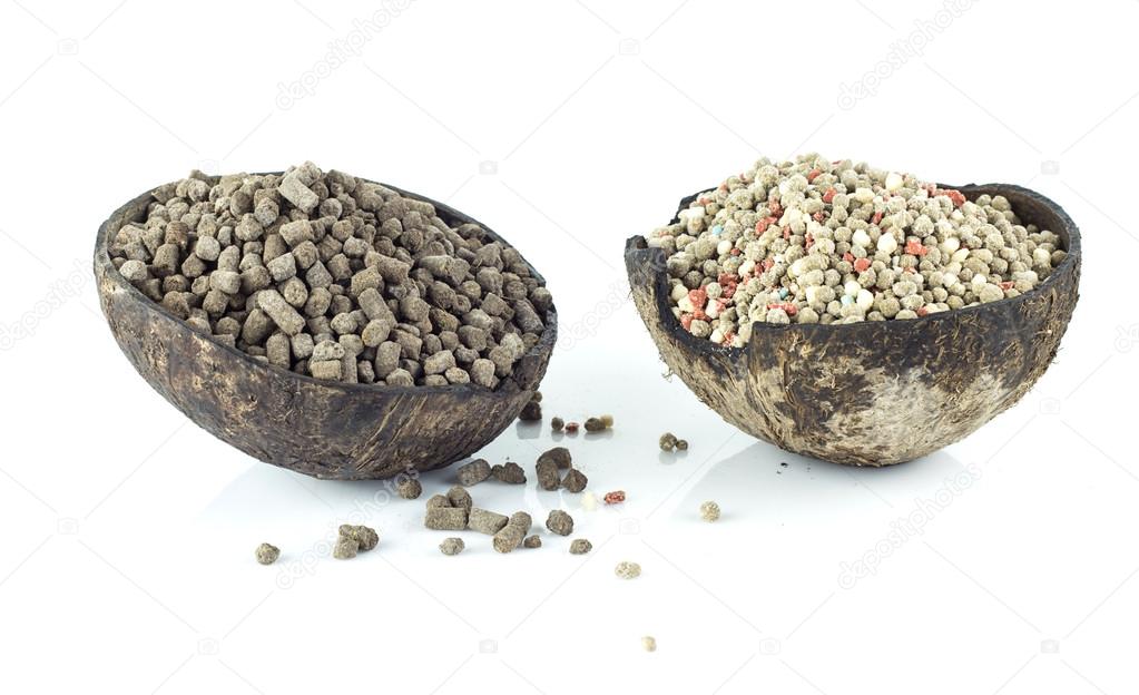 Chemical and natural fertilizer  for plant on white background