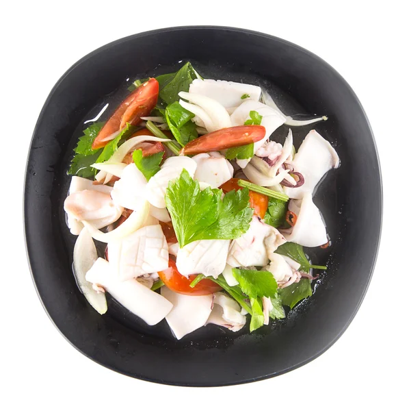 Pittige squid salade geïsoleerd op wit — Stockfoto