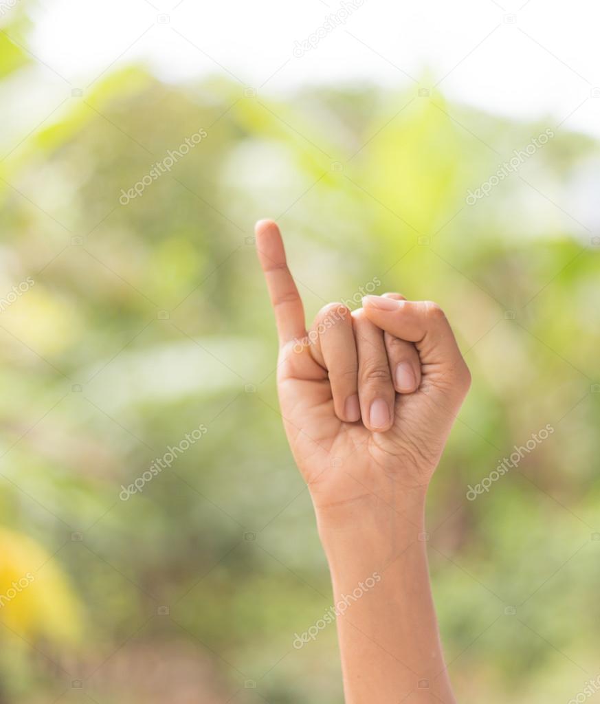 Hand of promise gesture against nature background