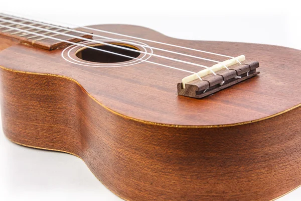 Um ukulele clássico no fundo branco — Fotografia de Stock