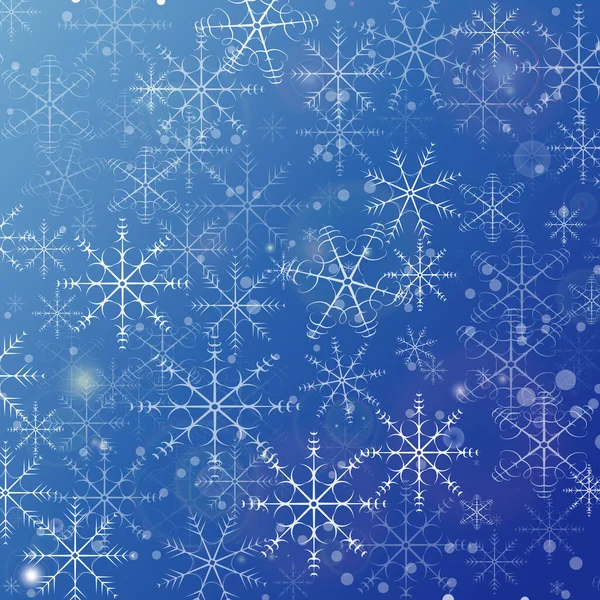 Sněhové vločky a oslnění na modrém gradientu - vánoční pozadí — Stock fotografie