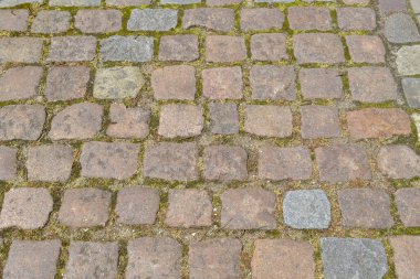 Eski dokulu kaldırım taşlarının arka planı