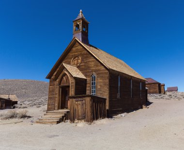Wooden rustic church building in Bodie ghost town clipart