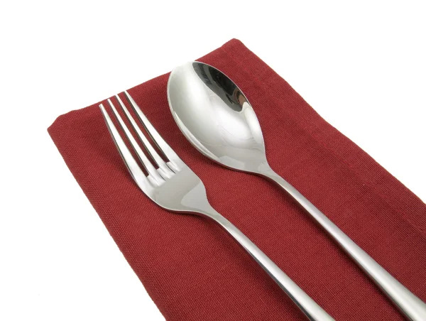 Foto cubiertos tenedor servilleta aislada — Foto de Stock