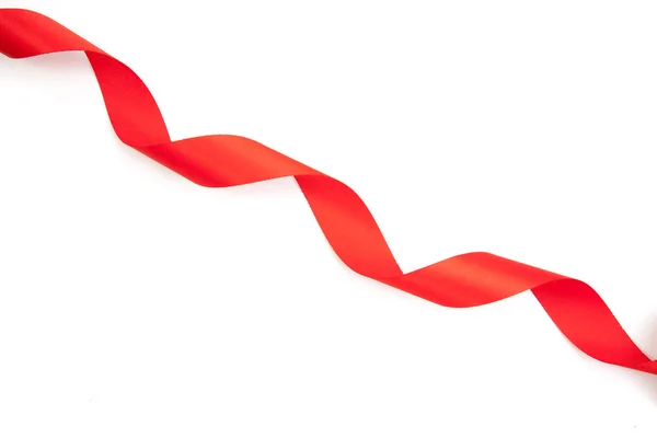 Red ribbon serpentine solated — Stock Photo, Image