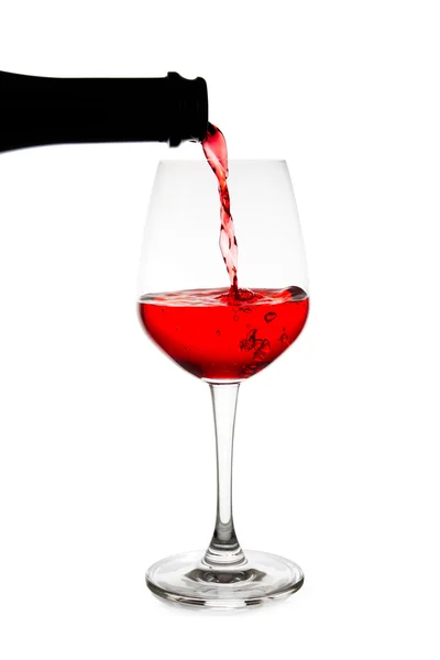 Vino rosso versando isolato — Foto Stock