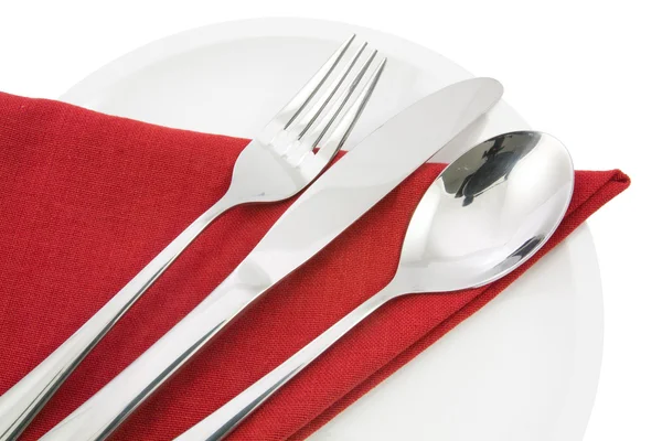 Gabel und Messer auf roter Serviette isoliert — Stockfoto