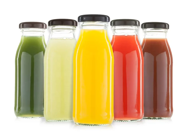 Бутылки с овощным и фруктовым соком — стоковое фото