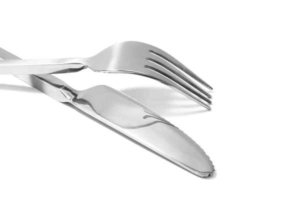 Tenedor y cuchillo en una servilleta —  Fotos de Stock