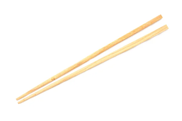 Dřevěné hůlky na bílém pozadí. — Stock fotografie