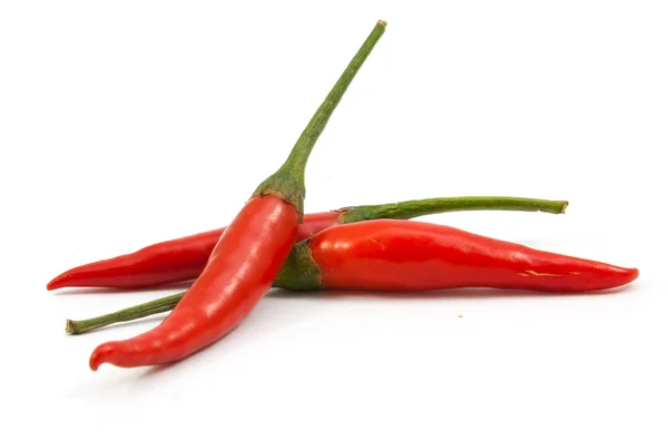 Red Hot chili peppers widok zbliżenie na białym tle — Zdjęcie stockowe