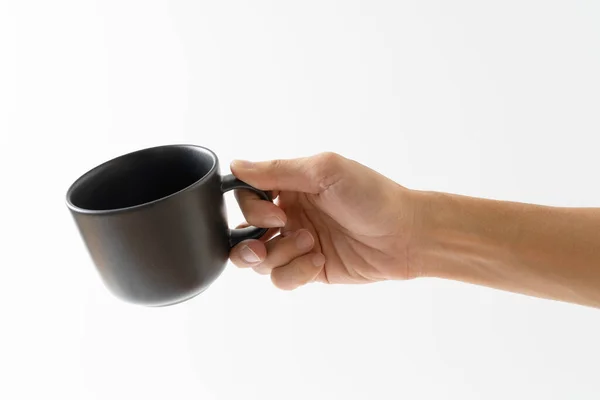 Mano Celebración Café Taza Color Negro Sobre Fondo Blanco — Foto de Stock