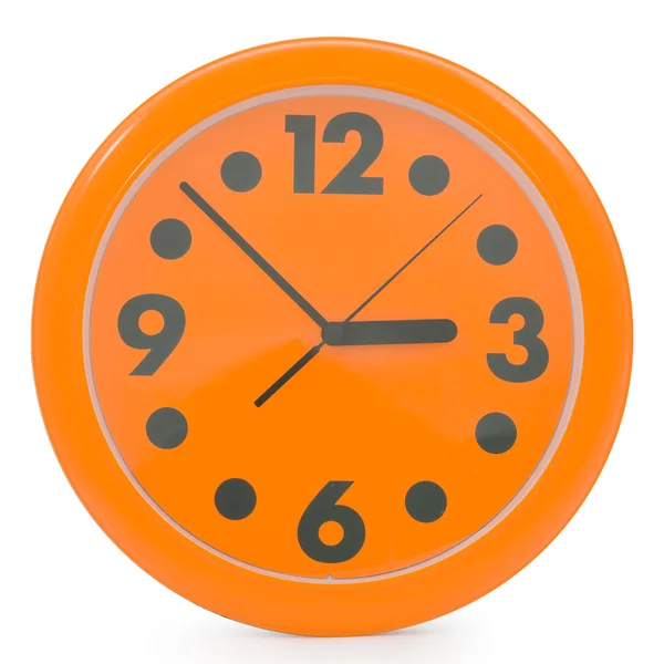 Oranžový nástěnné hodiny — Stock fotografie