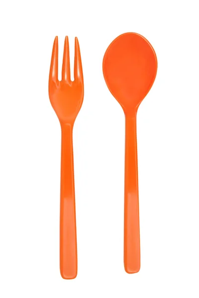 Orange plastic fork and spoon — Stock Photo, Image