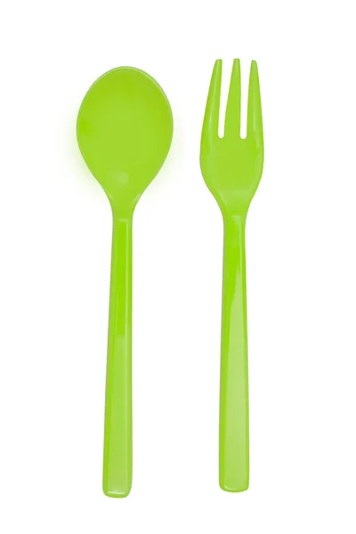 Tenedor y cuchara de plástico verde —  Fotos de Stock