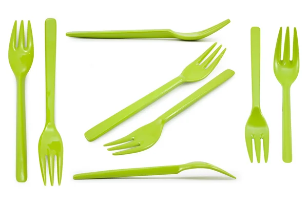 Collection green plastic forks isolated on white background — Stock Photo, Image