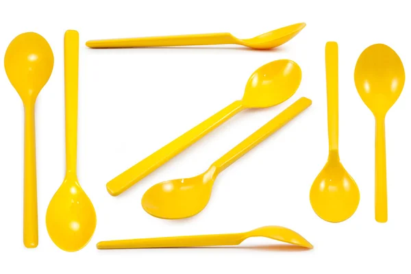 Collection  yellow plastic spoon isolated — Stock Photo, Image