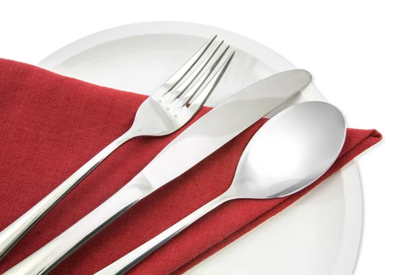 Tenedor y cuchillo en servilleta roja aislada — Foto de Stock