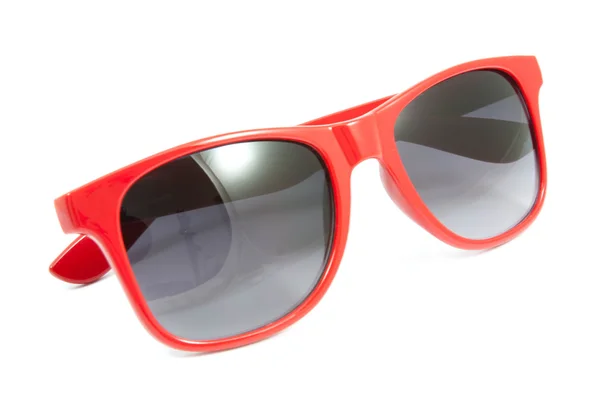 Óculos de sol vermelhos no fundo branco — Fotografia de Stock