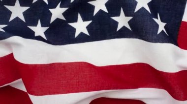 Amerikan bayrağının hareketli görüntüsü yatıyordu. Başkanlık günü, 4 Temmuz, gaziler günü, İşçi Bayramı, Anma Günü, kutlama konsepti. Amerika bayrağı. Web ve sosyal medya şablonu.