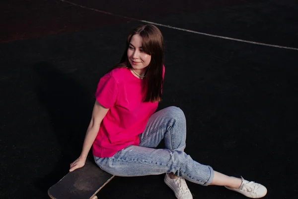 Smiling Young Woman Pink Shirt Sitting Skateboard Summer Activity Healthy — Stock Photo, Image