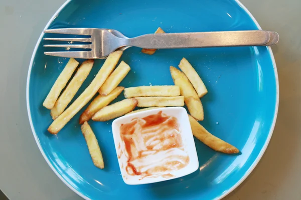 French fries  Potato in dish with tamato sauce — Stock Photo, Image