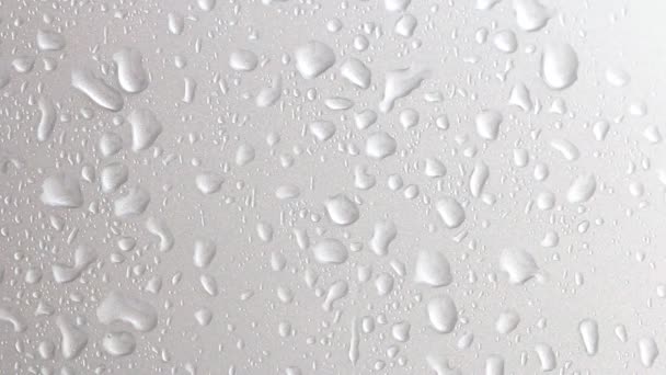 Fundo abstrato de gotas de água e fluxo em vidro — Vídeo de Stock