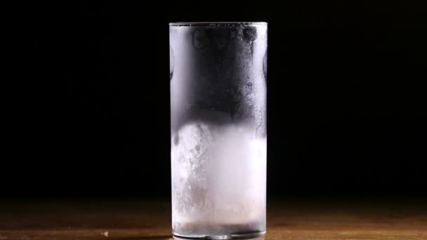 Beer poured in cold ice glass — Stock Video