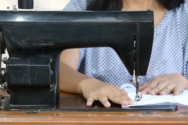 Woman working with sewing machine. — Stock Photo, Image